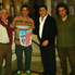 Christian Meloni con el banderín que le obsequió el Consejo Auxiliar de Futsal en Rosarina.