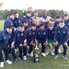 El plantel recibiendo el trofeo como subcampeones.